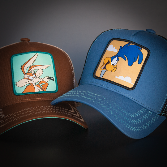 Blue OVERLORD X Looney Tunes smiling Road Runner trucker baseball cap hat with light blue zig zag stitching. PVC Overlord logo.