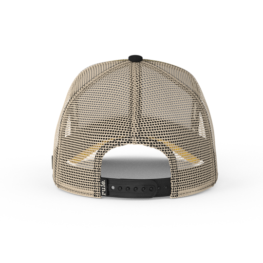 Black OVERLORD X Flintstones Bamm Bamm trucker baseball cap with khaki mesh and black adjustable strap.