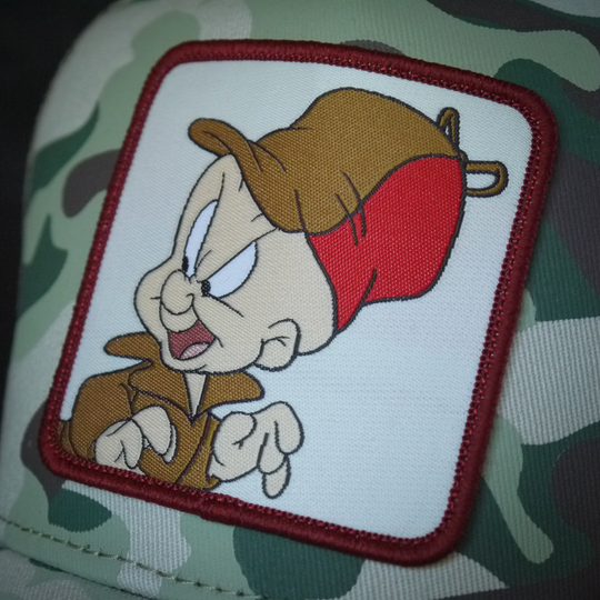 Camo OVERLORD X Looney Tunes Elmer Fudd trucker baseball cap hat woven Overlord patch closeup.