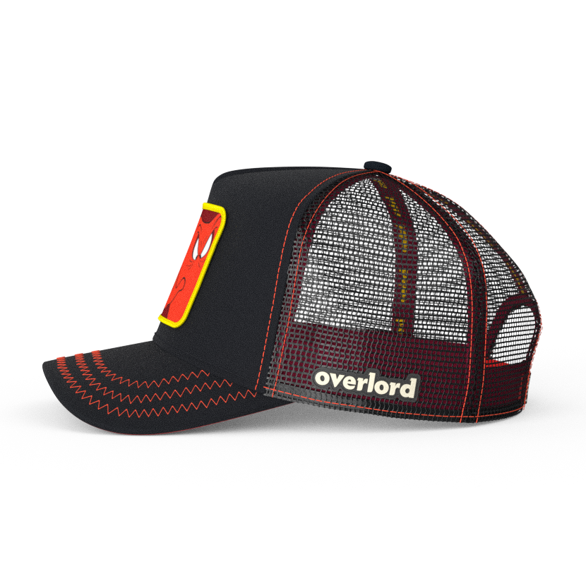 Black OVERLORD X Looney Tunes Gossamer trucker baseball cap hat with black mesh. PVC Overlord logo.