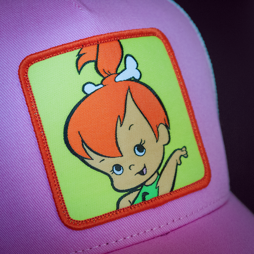 Pink OVERLORD X Flintstones Pebbles trucker baseball cap woven Overlord patch closeup.