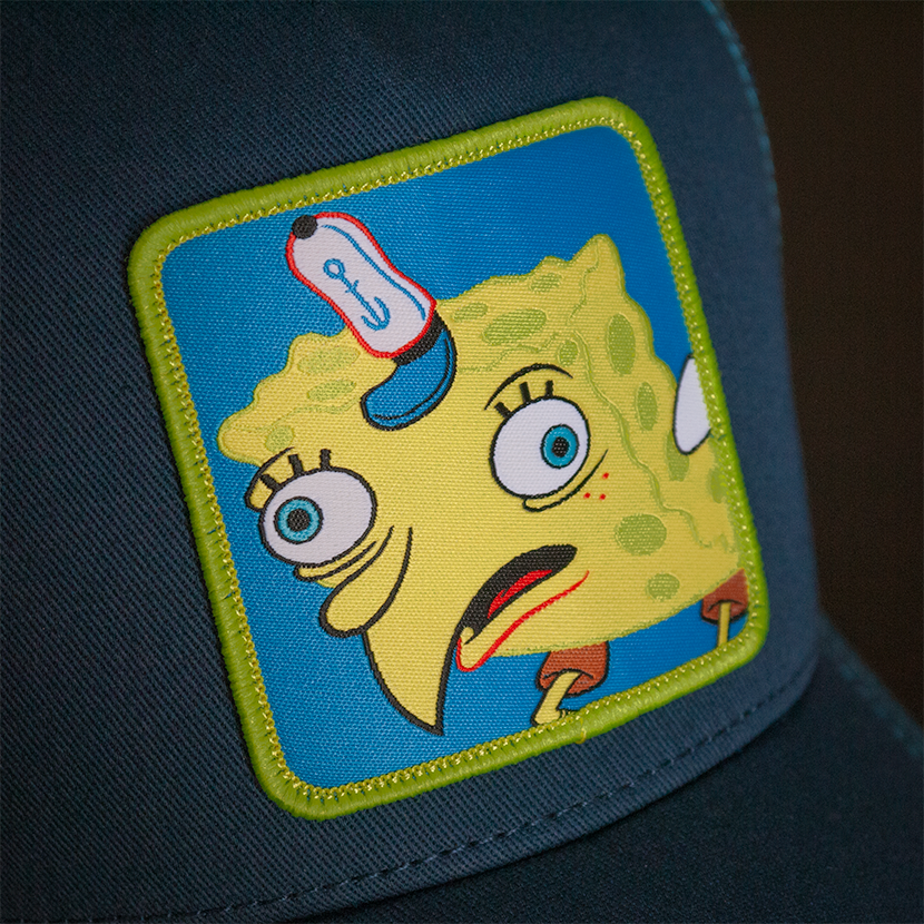 Navy OVERLORD X SpongeBob ChickenBob meme trucker baseball cap hat woven Overlord patch closeup.