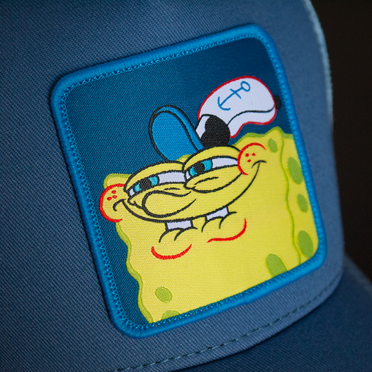 Blue OVERLORD X SpongeBob sneaky smile meme trucker baseball cap hat woven Overlord patch closeup.
