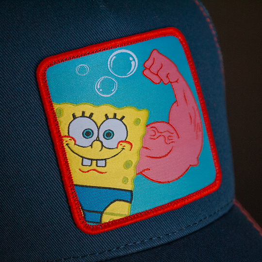 Navy OVERLORD X SpongeBob MuscleBob trucker baseball cap hat woven Overlord patch closeup.