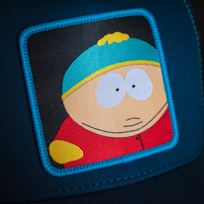 Navy South Park Eric Cartman trucker baseball cap hat woven Overlord patch closeup.