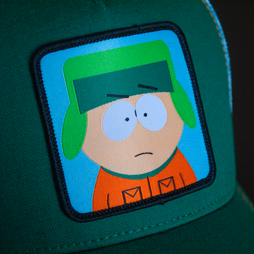Green OVERLORD X South Park Kyle trucker baseball cap hat woven Overlord patch closeup.