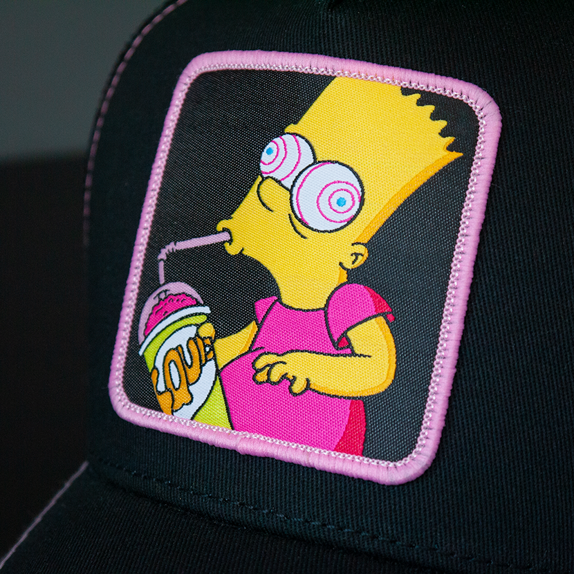Black OVERLORD X The Simpsons Bart drinking out of Squishee cup trucker baseball cap hat woven Overlord patch closeup.