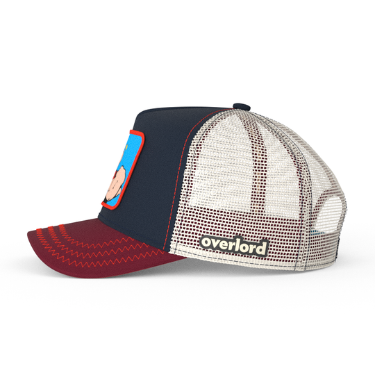 Navy and red OVERLORD X Popeye smug Popeye trucker baseball cap hat with cream mesh. PVC Overlord logo.