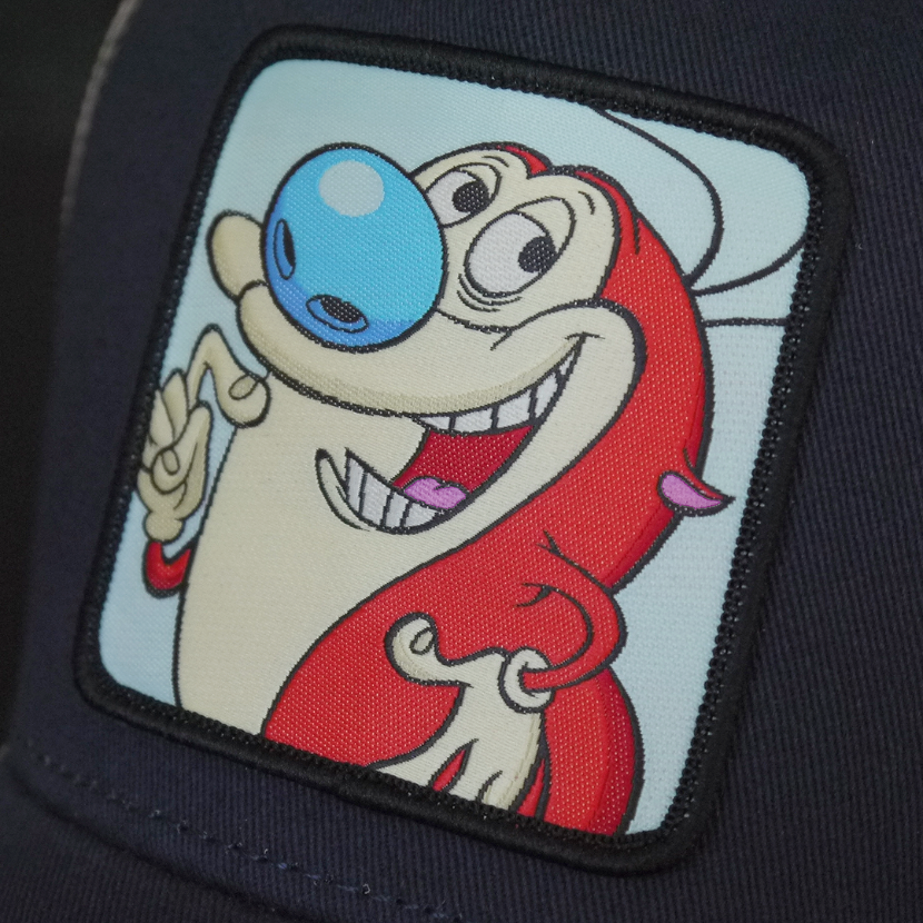 Navy OVERLORD X Ren and Stimpy smiling Stimpy trucker baseball cap hat woven Overlord patch closeup.