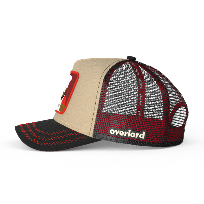 Tan and black OVERLORD X South Park Chef trucker baseball cap hat with black mesh. PVC Overlord logo.
